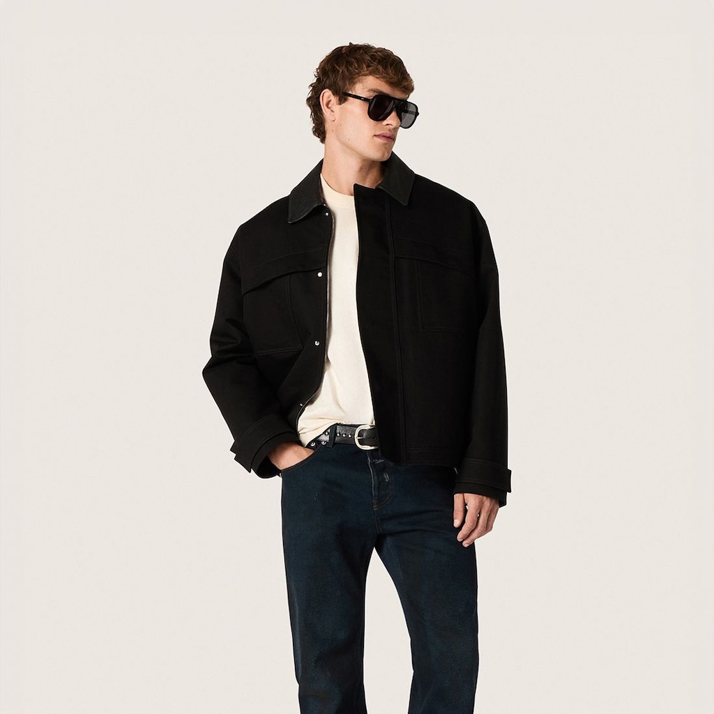 male-model-wearing-black-jacket-and-pants