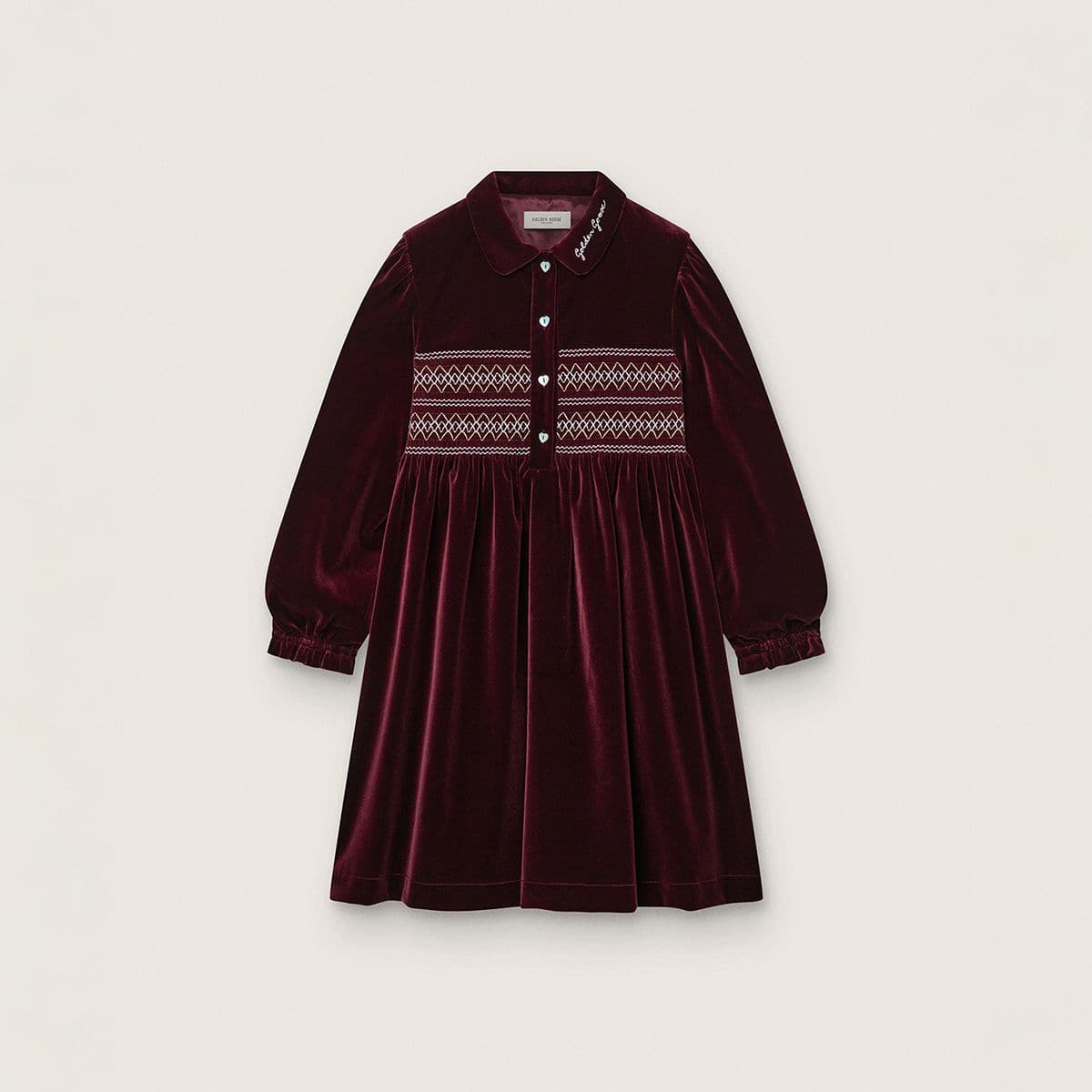 burgundy-dress-with-white-lines-decorations